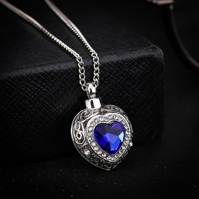 Crystal heart bottle pendant